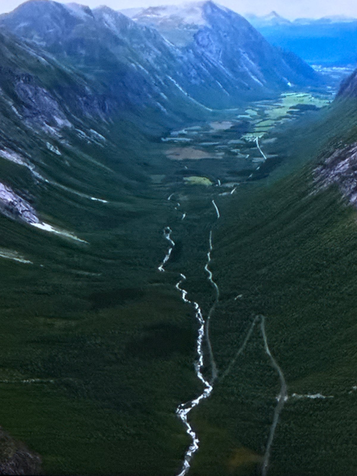 Forested valley and winding river near Sinyavino, Russia