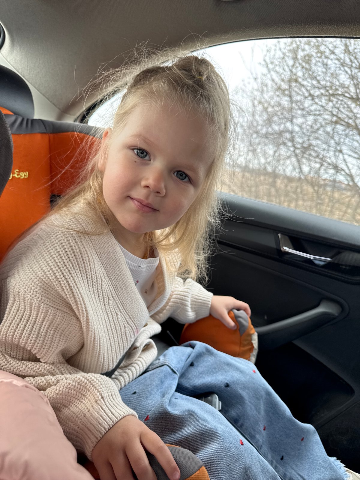 Child photographed in car in Горный, Russia