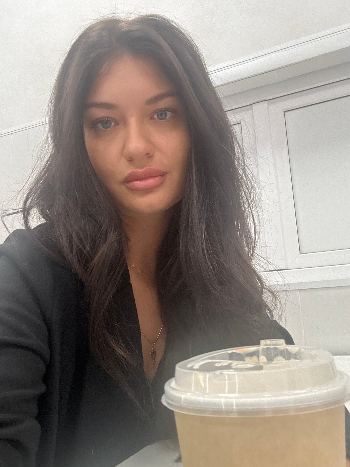 Woman photographed in multiple portraits over morning hour