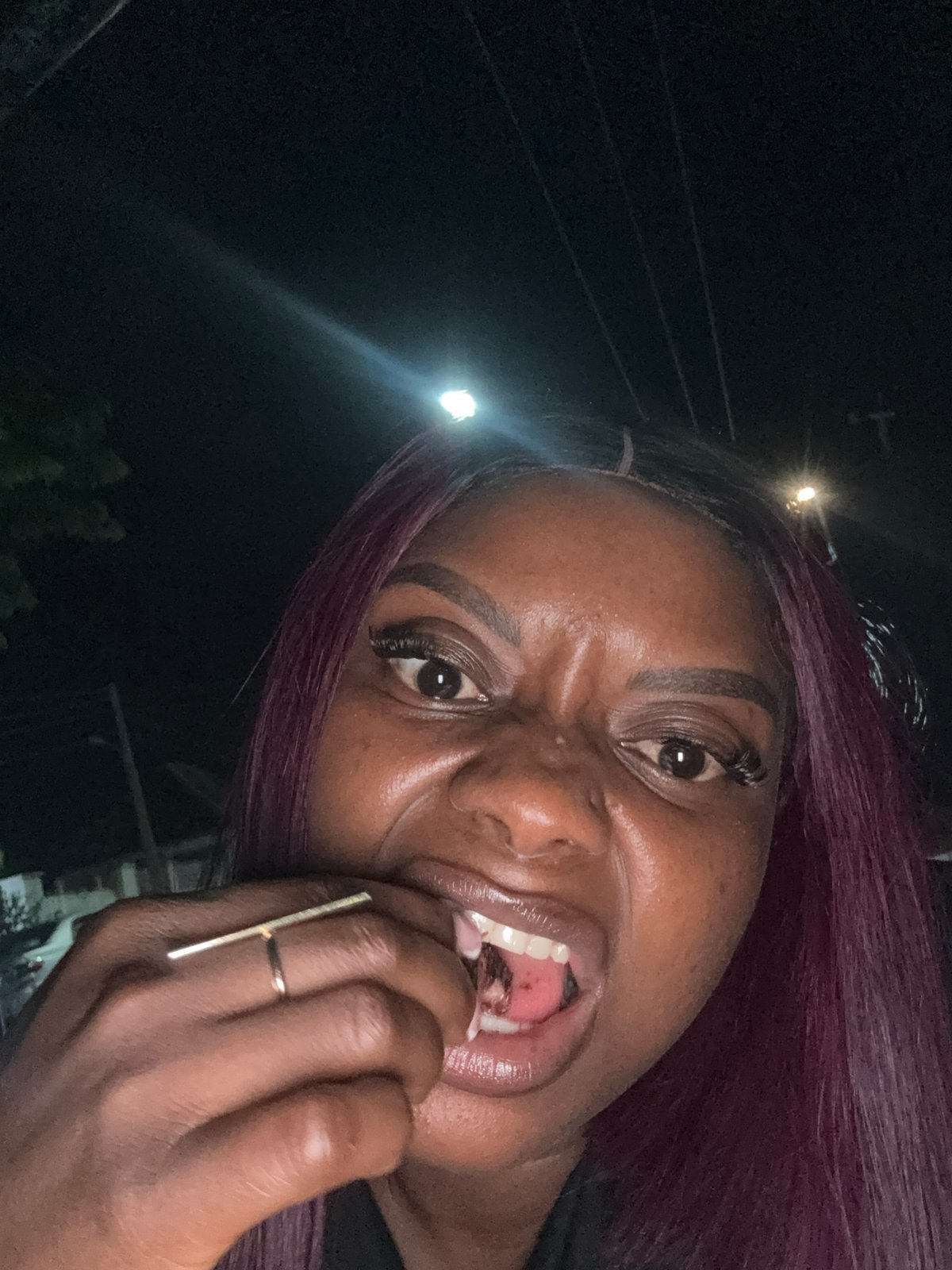 Late-night grilling and blue neon at Orion Boulevard, Abuja