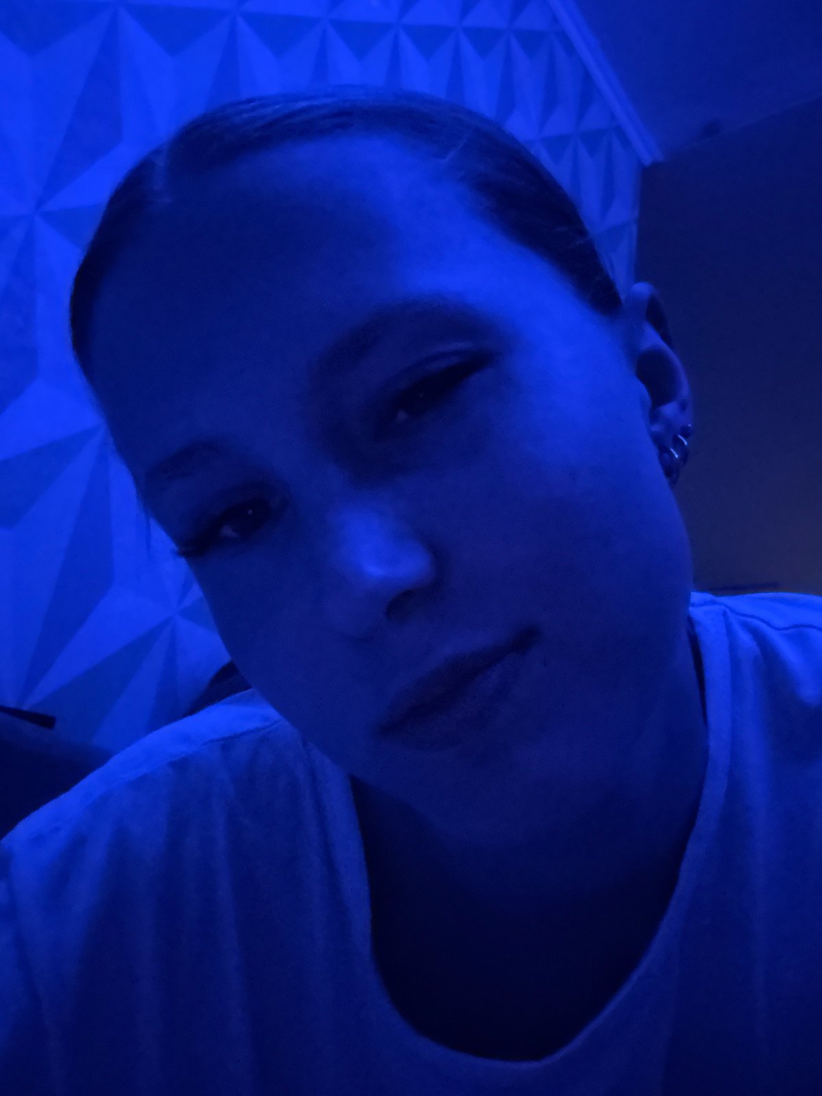 Domestic gathering documented in Chaikovsky home with blue lighting