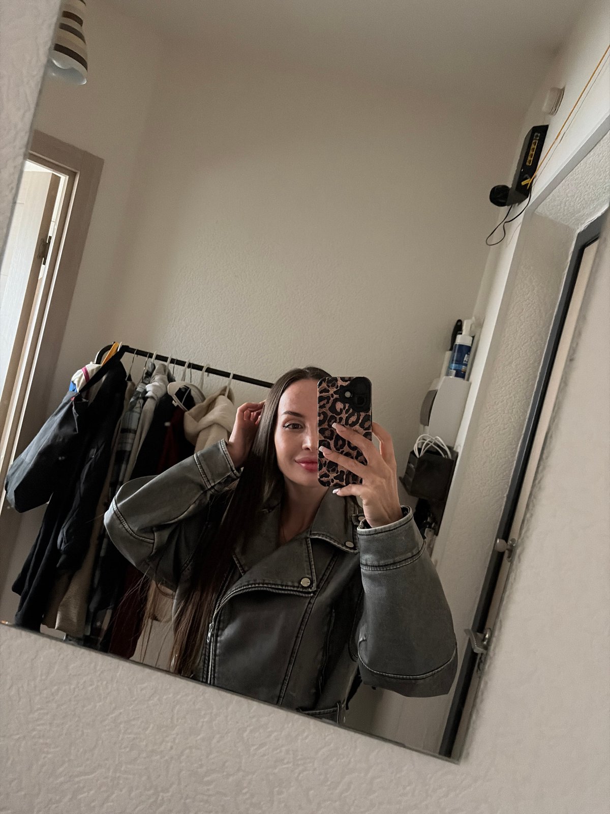 Mirror selfie in a hallway near St. Petersburg