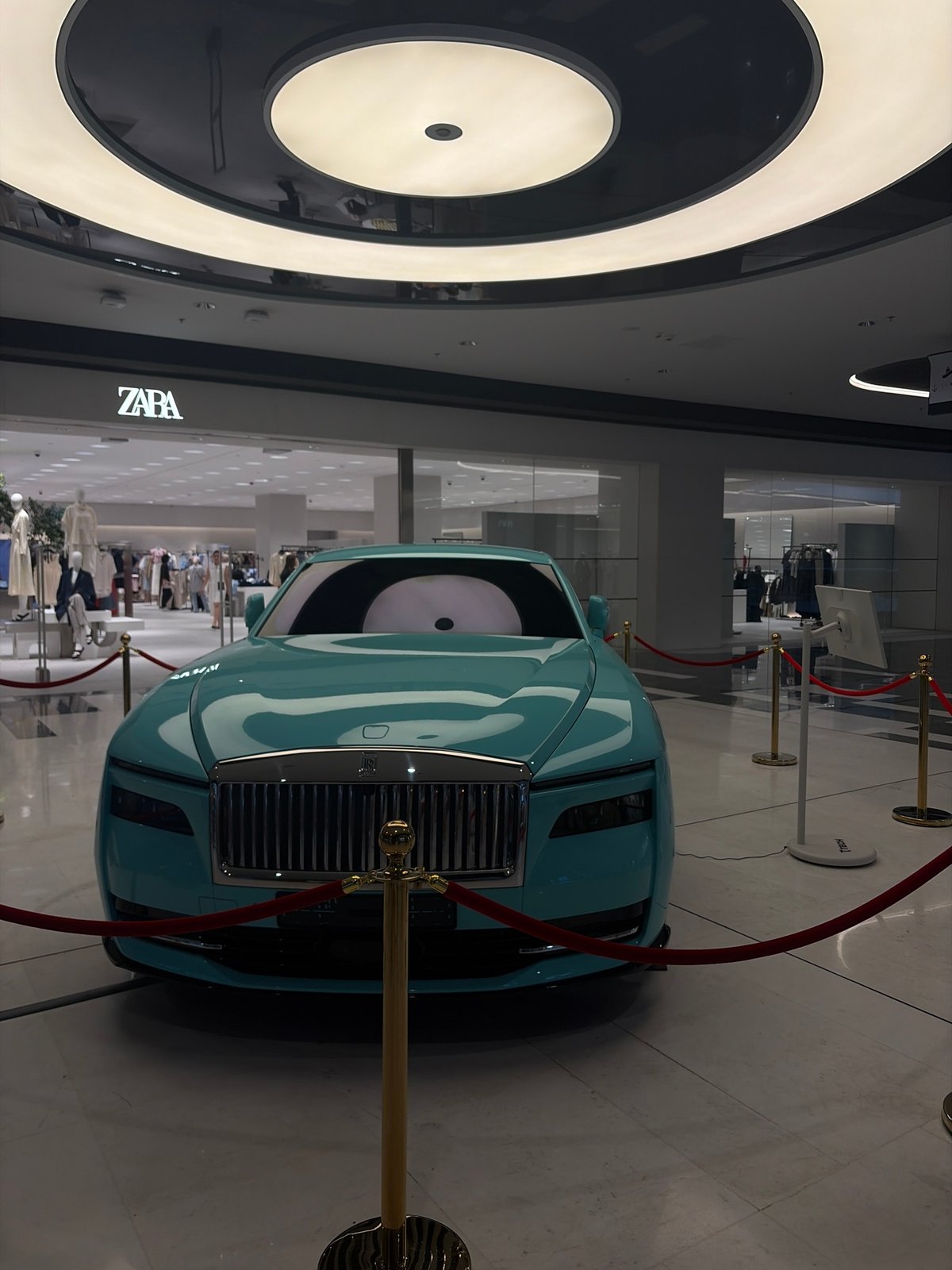 Luxury car show and live music performance at Tashkent mall