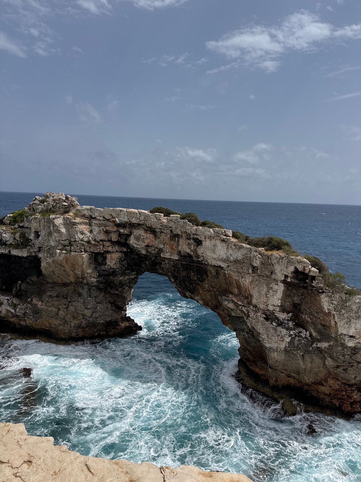 Natural rock arch Es Pontàs observed off Santanyí coast