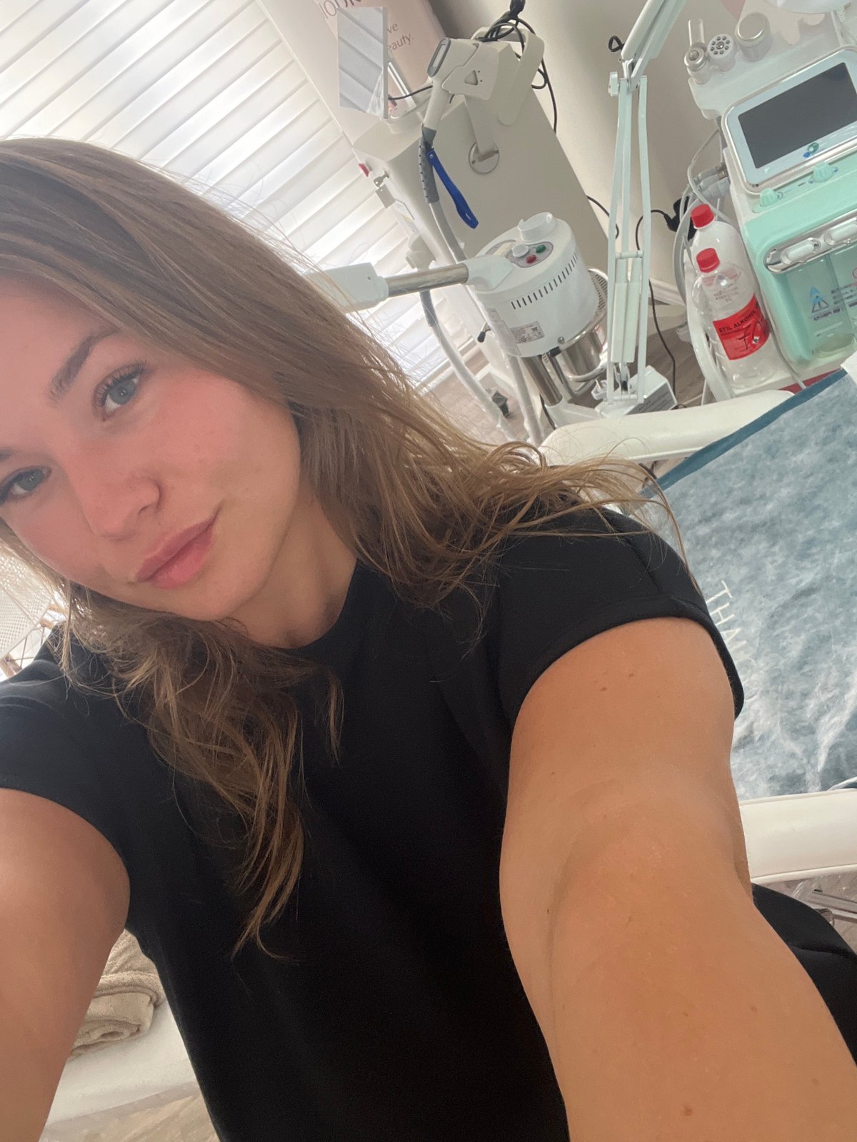 Woman documents aesthetic medical spa visit in Budva