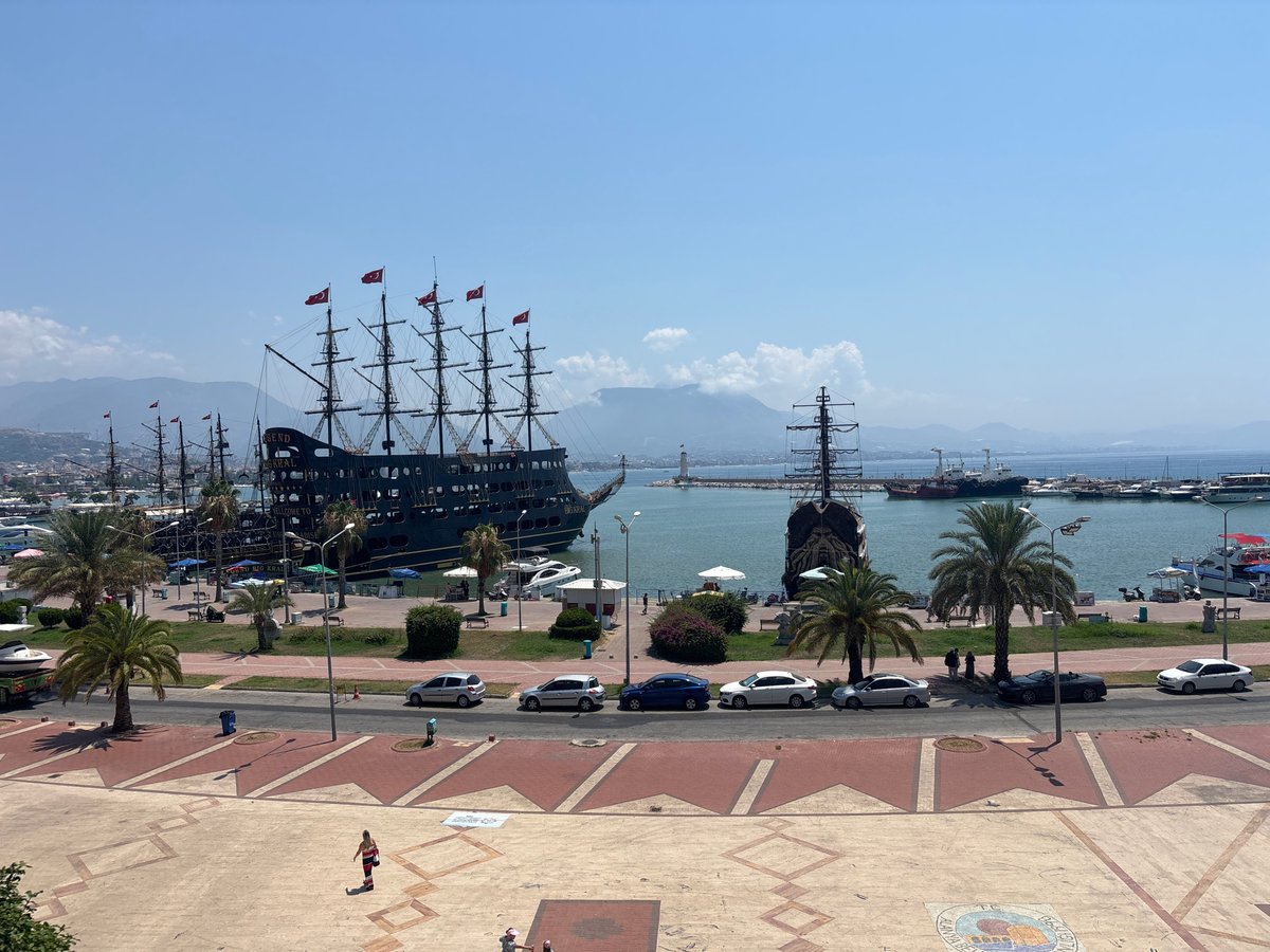 Alanya harbor: promenade, pirate ship, and waterfall feature