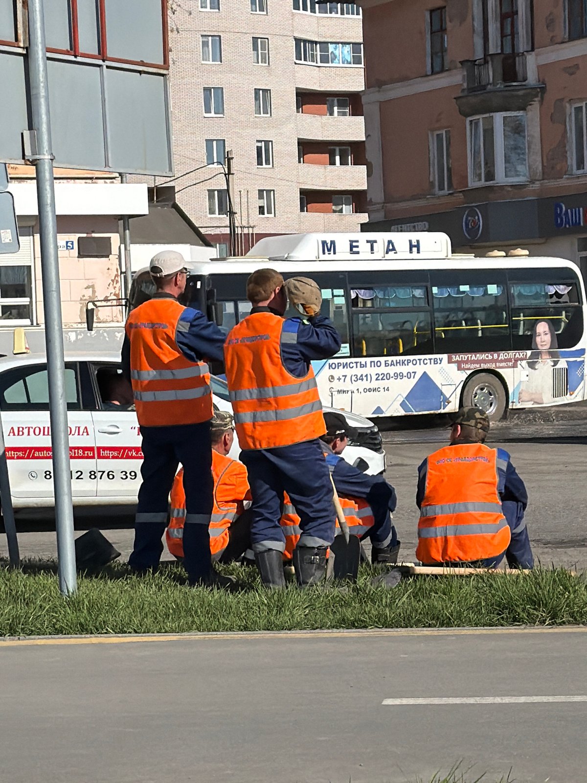 Daily life captured in Votkinsk: road work and resting cat