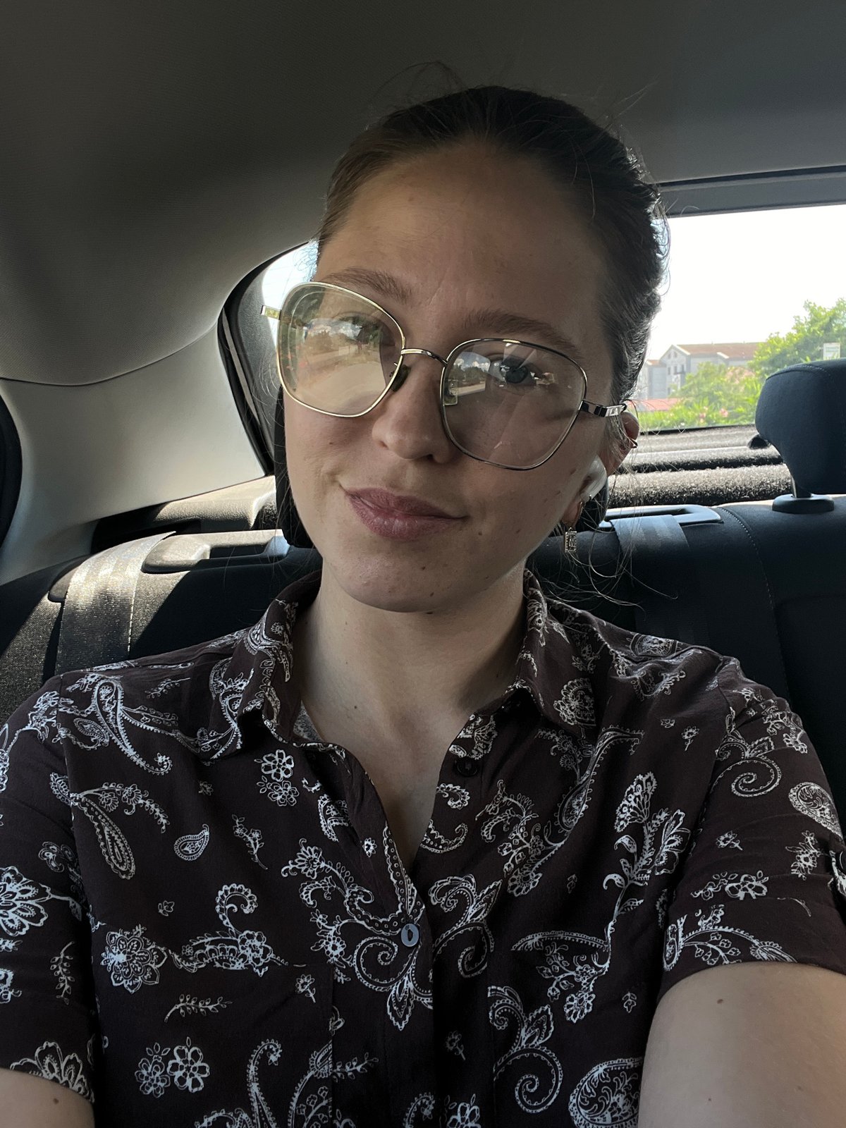 Woman photographed in car in Podgorica, Montenegro