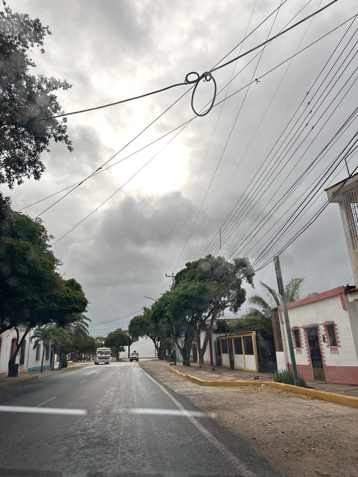 Rainy evening drive through Santa Ana, Venezuela streets