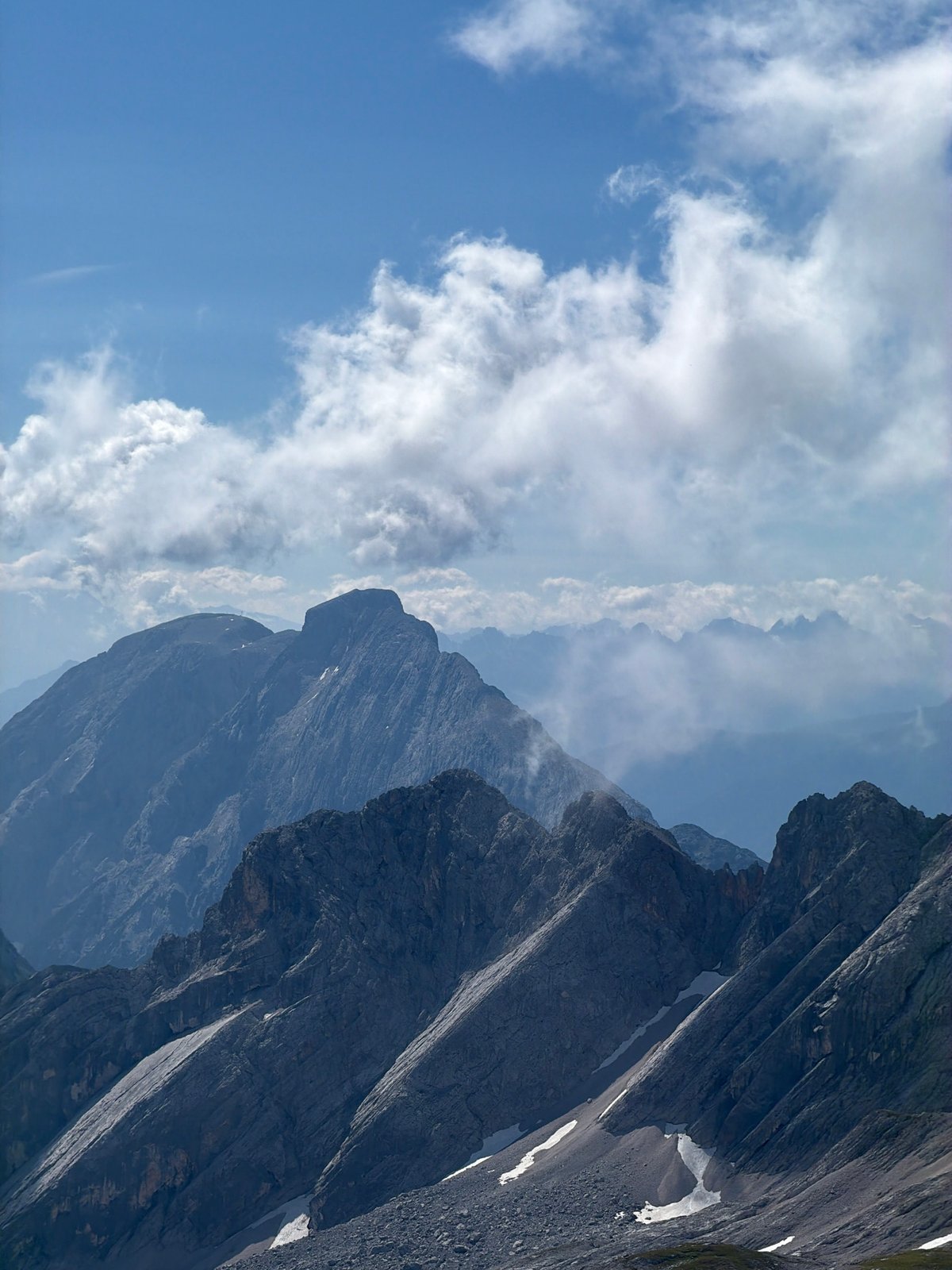 Alpine ridge chapel and mountain views above Garmisch-Partenkirchen