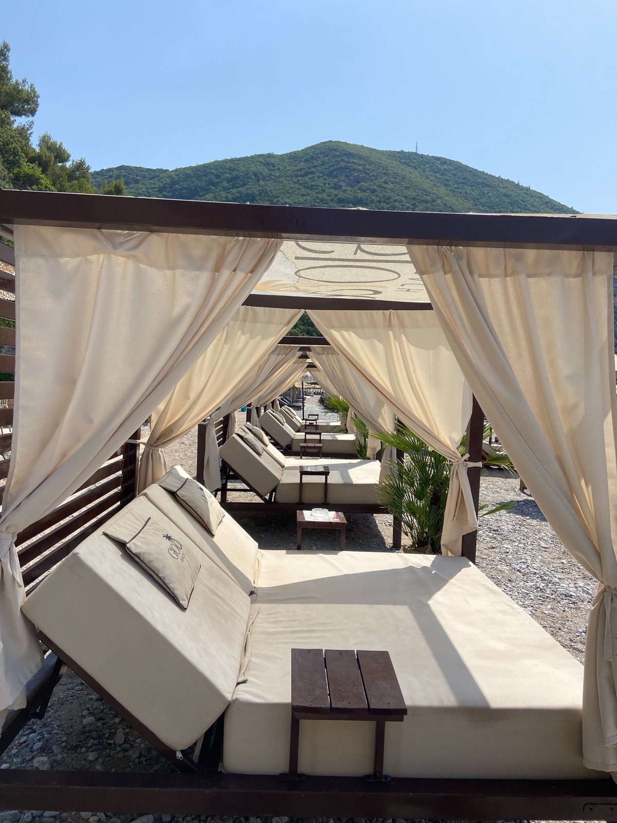 Lazy summer morning on a Montenegrin pebble beach