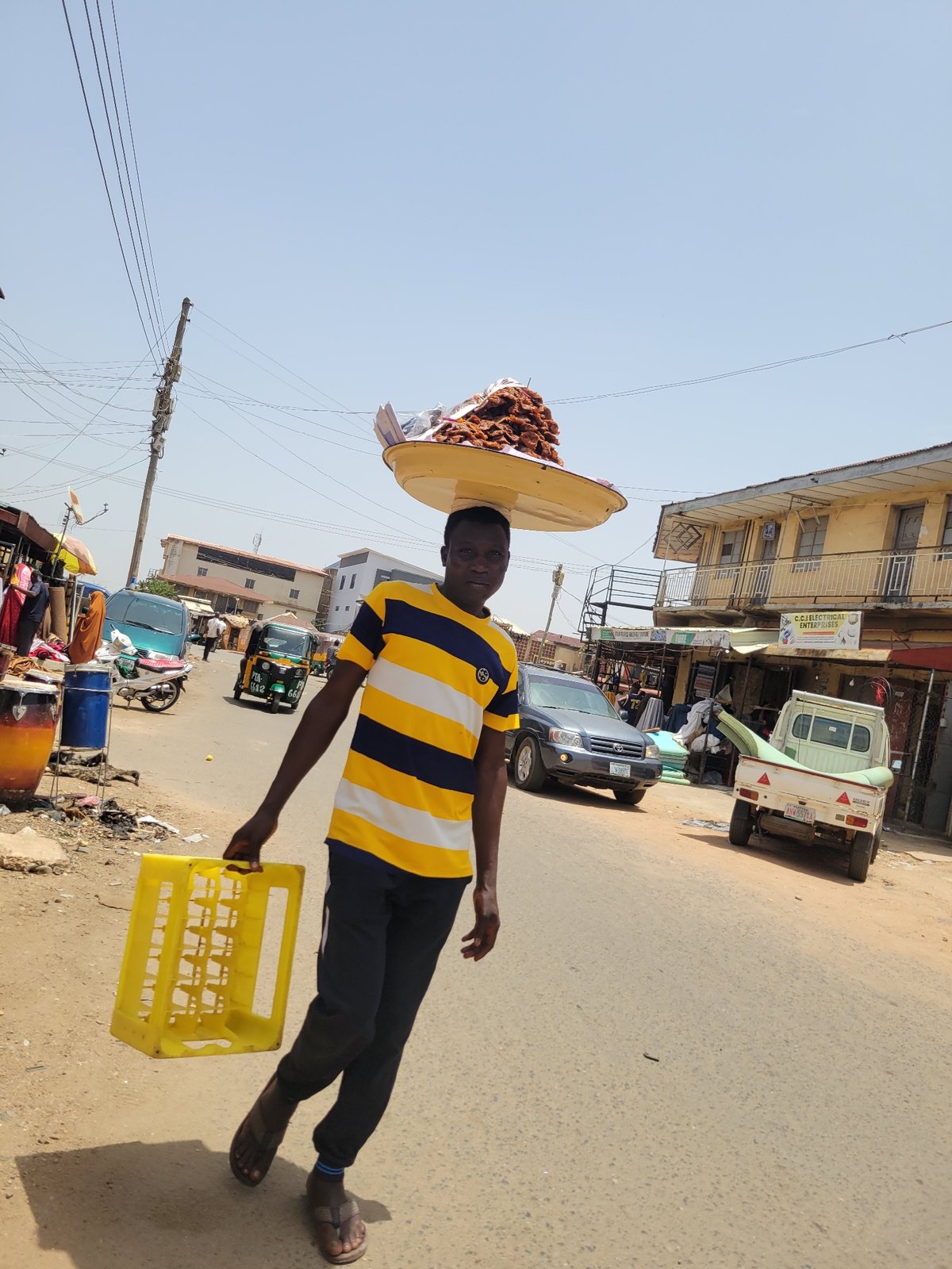 Daily street commerce and pedestrian activity observed in Jos, Nigeria
