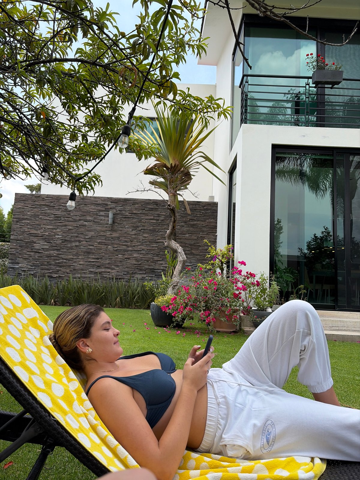Casual afternoon gathering at modern home with lounging and dining