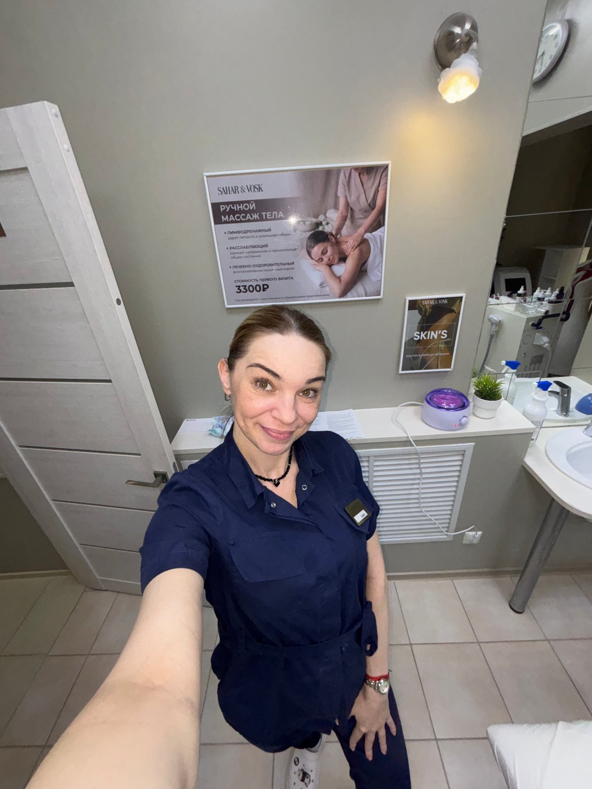 Professional takes selfies in salon or medical facility