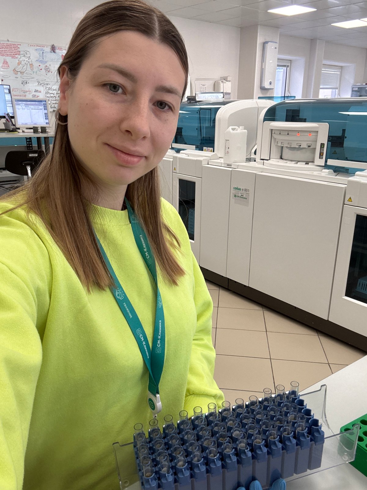 Woman takes selfie in Moscow medical laboratory