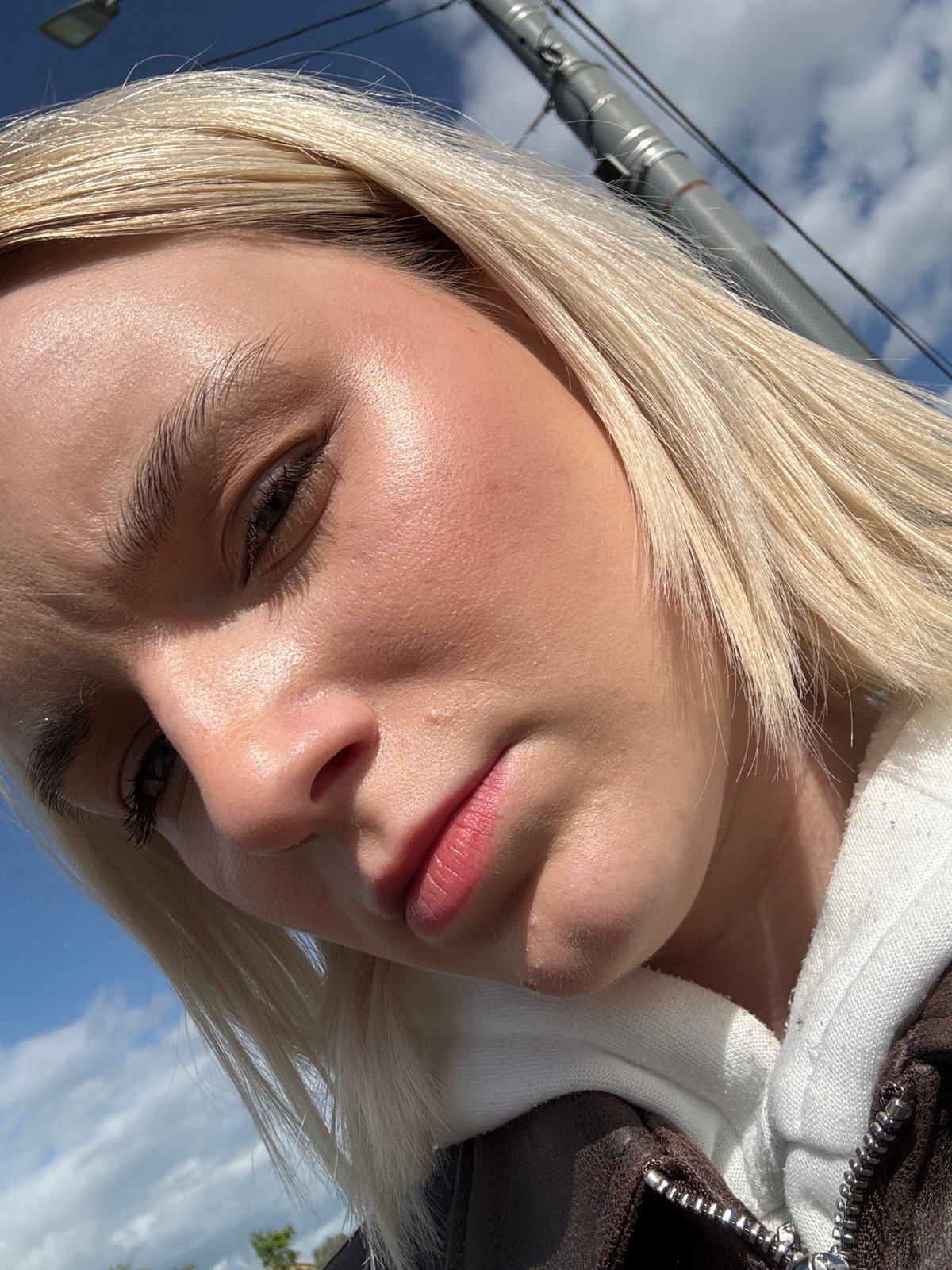 Woman takes selfies on Saint Petersburg bus ride