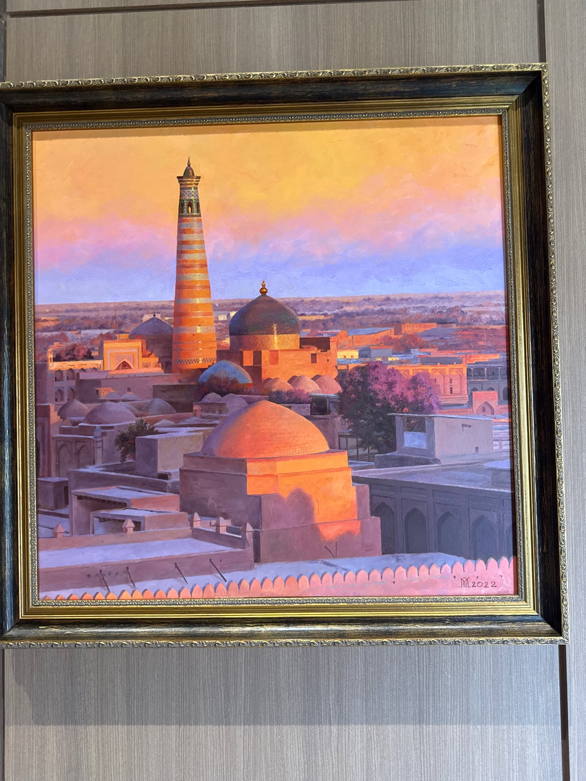 Inside a Tashkent office waiting room lined with framed art