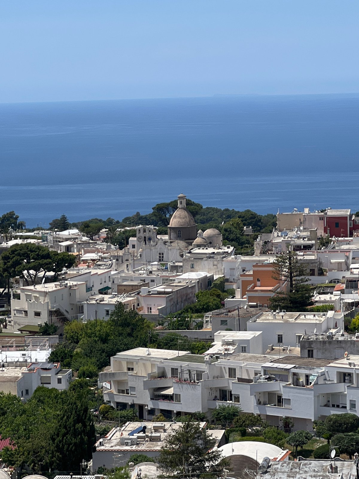 Tourist captures scenic Anacapri views via chairlift tour