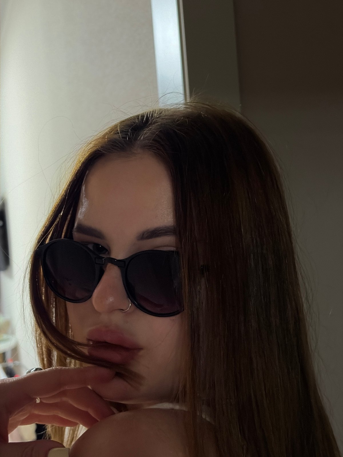 Woman in sunglasses photographed in multiple poses, Krasnodar