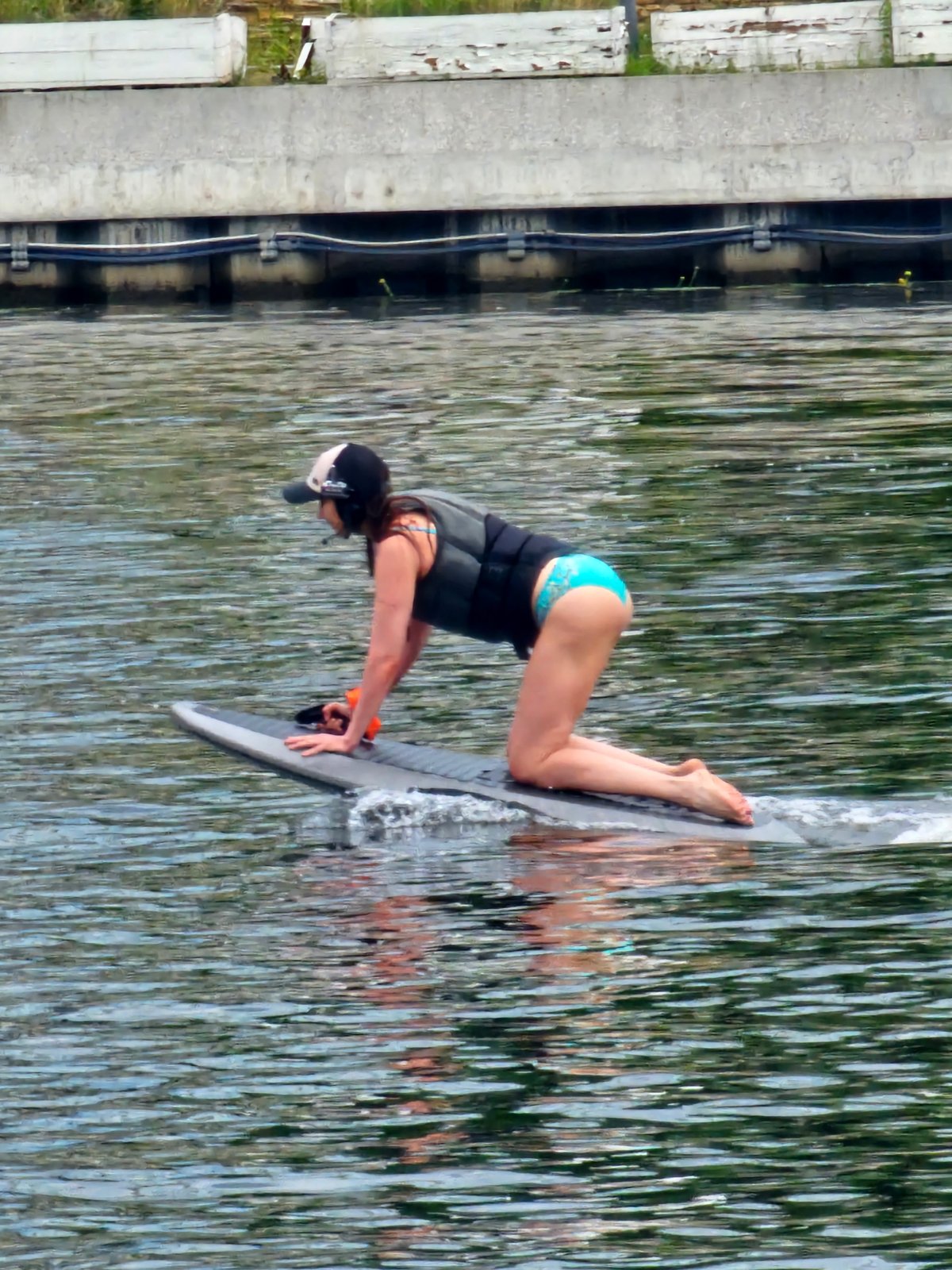 Summer morning at Khimki's waterfront: bikes, boards, and ducks