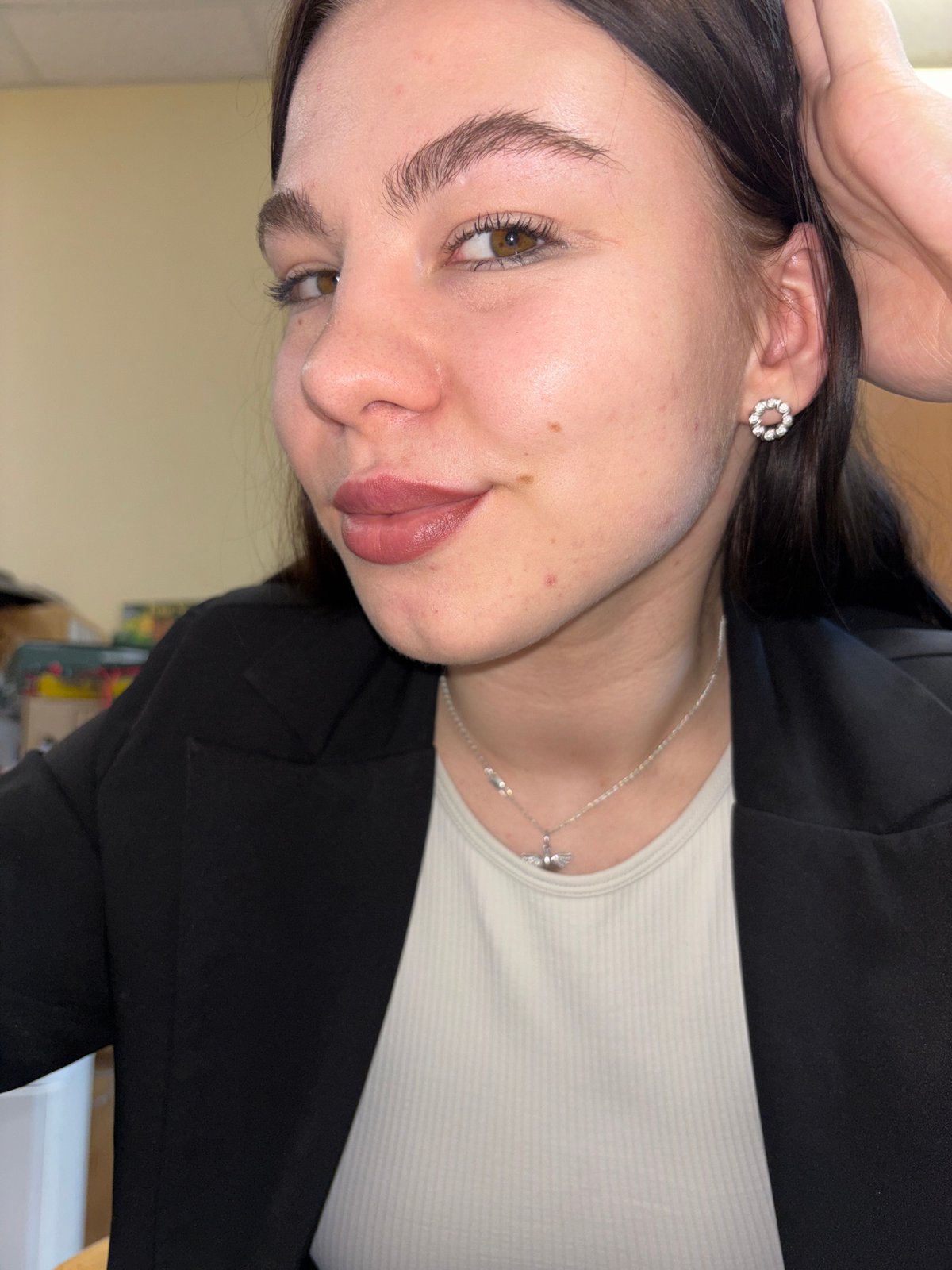 Woman photographed twice in office setting, Perm Russia