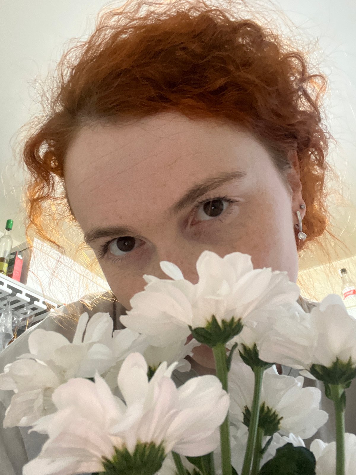 Woman takes selfies indoors in Chaikovsky, Russia