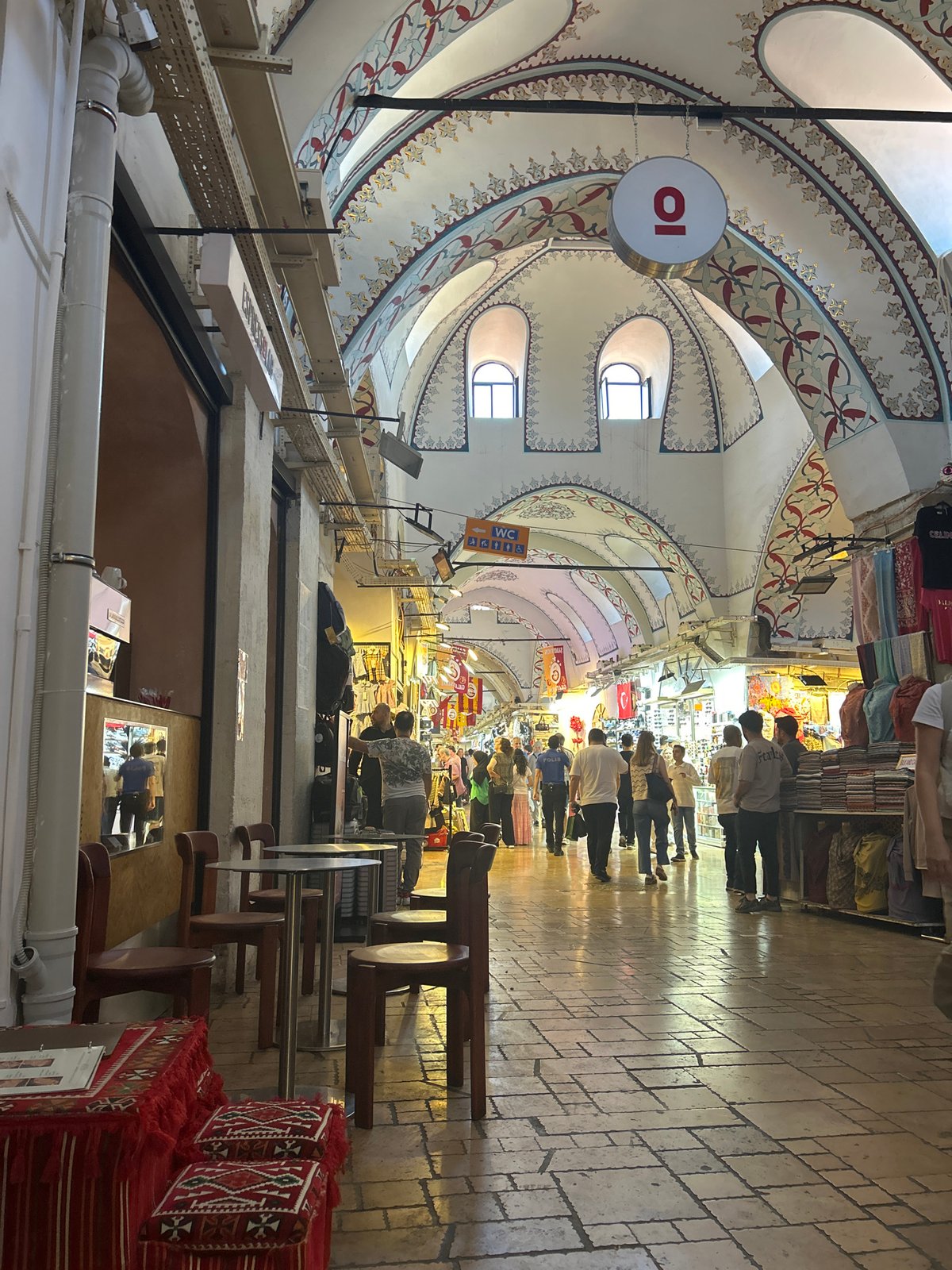 Tourist documents Grand Bazaar visit, Turkish coffee culture in Istanbul