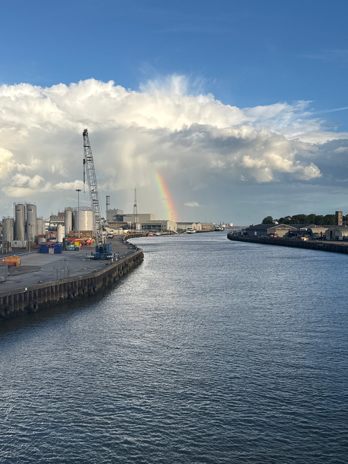 Evening bridge visit captures Great Yarmouth harbor views with rainbow