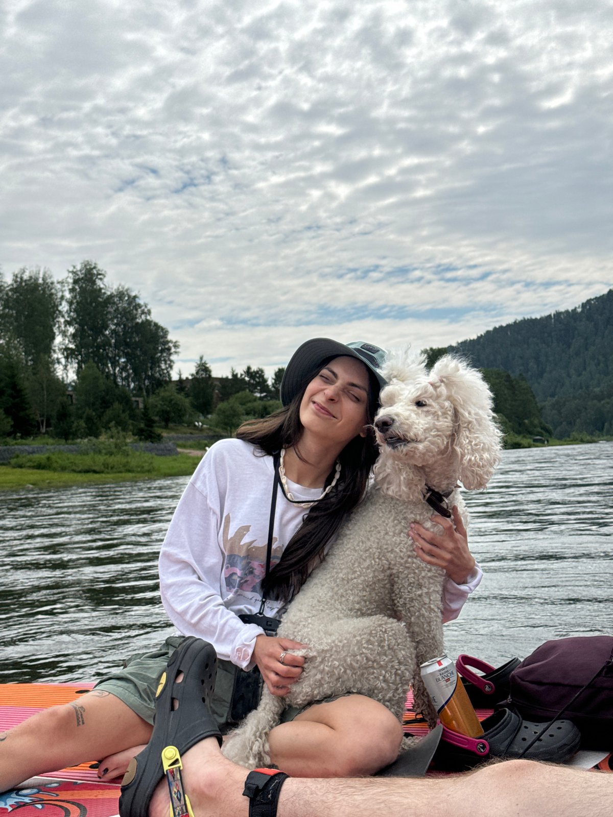 Paddleboarding with a poodle on a Russian river