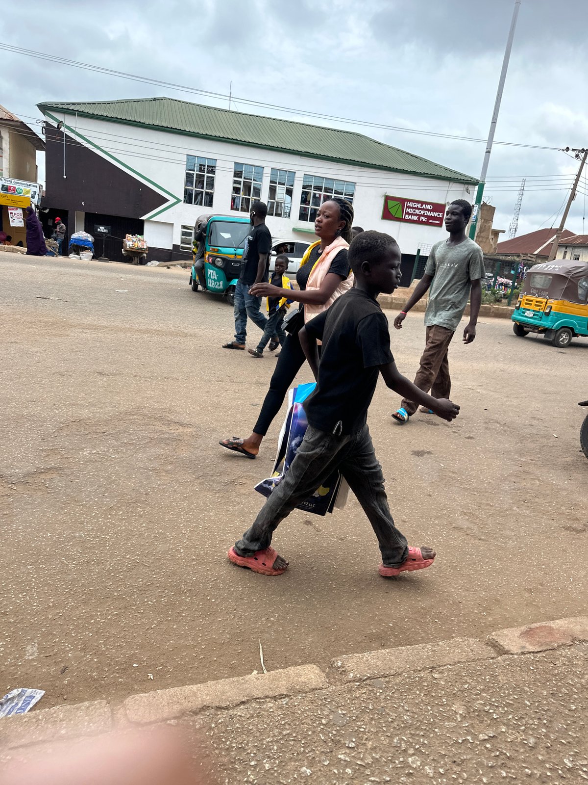 Street commerce and daily movement through Bukuru market, Nigeria