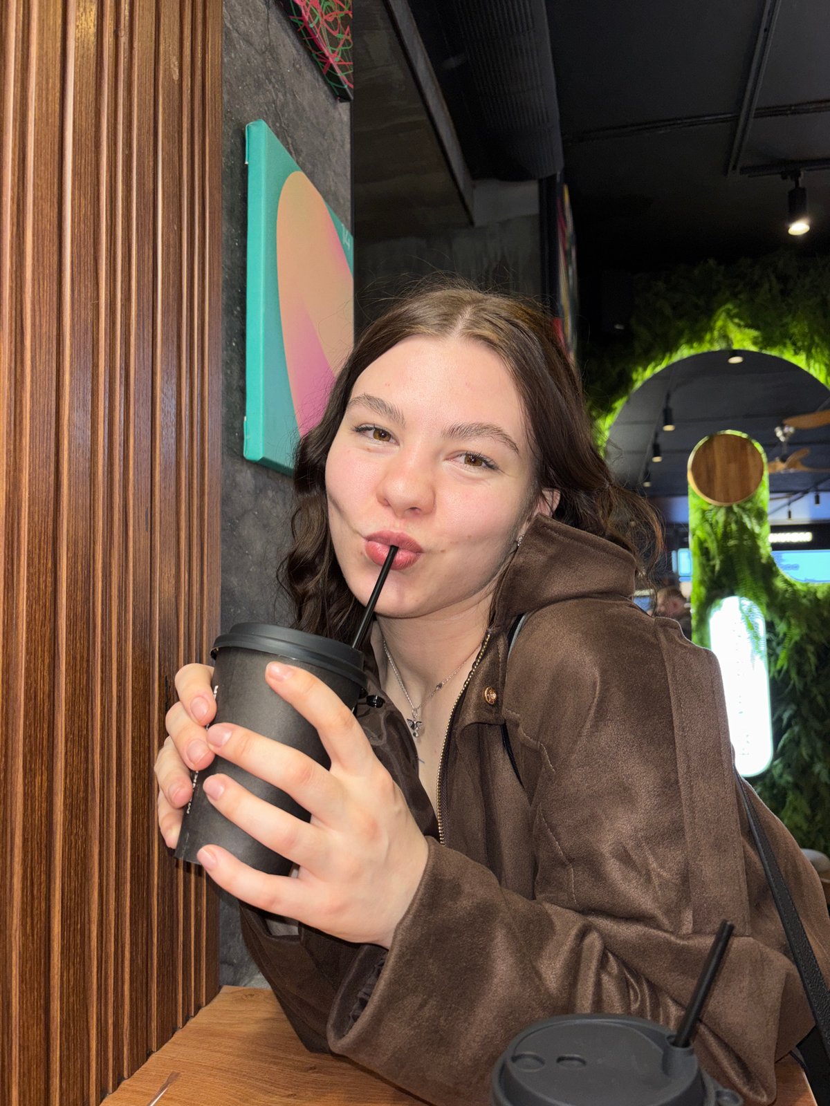 Young people socialize at cafe in Perm, Russia