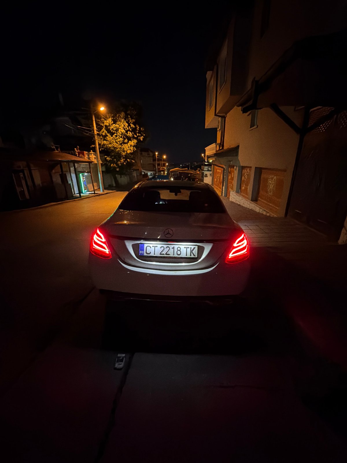 Evening scenes documented in Stara Zagora: parked car, indoor gaming