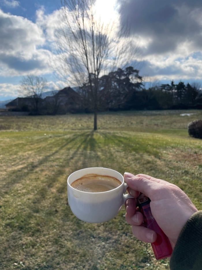 Morning coffee break on frosty patio in Chambéry