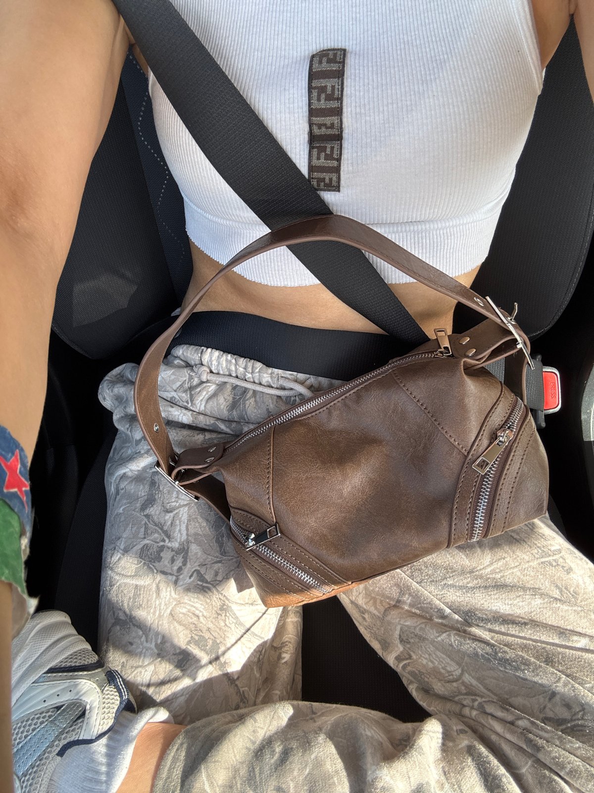 Driver photographed in vehicle in Riverside, California