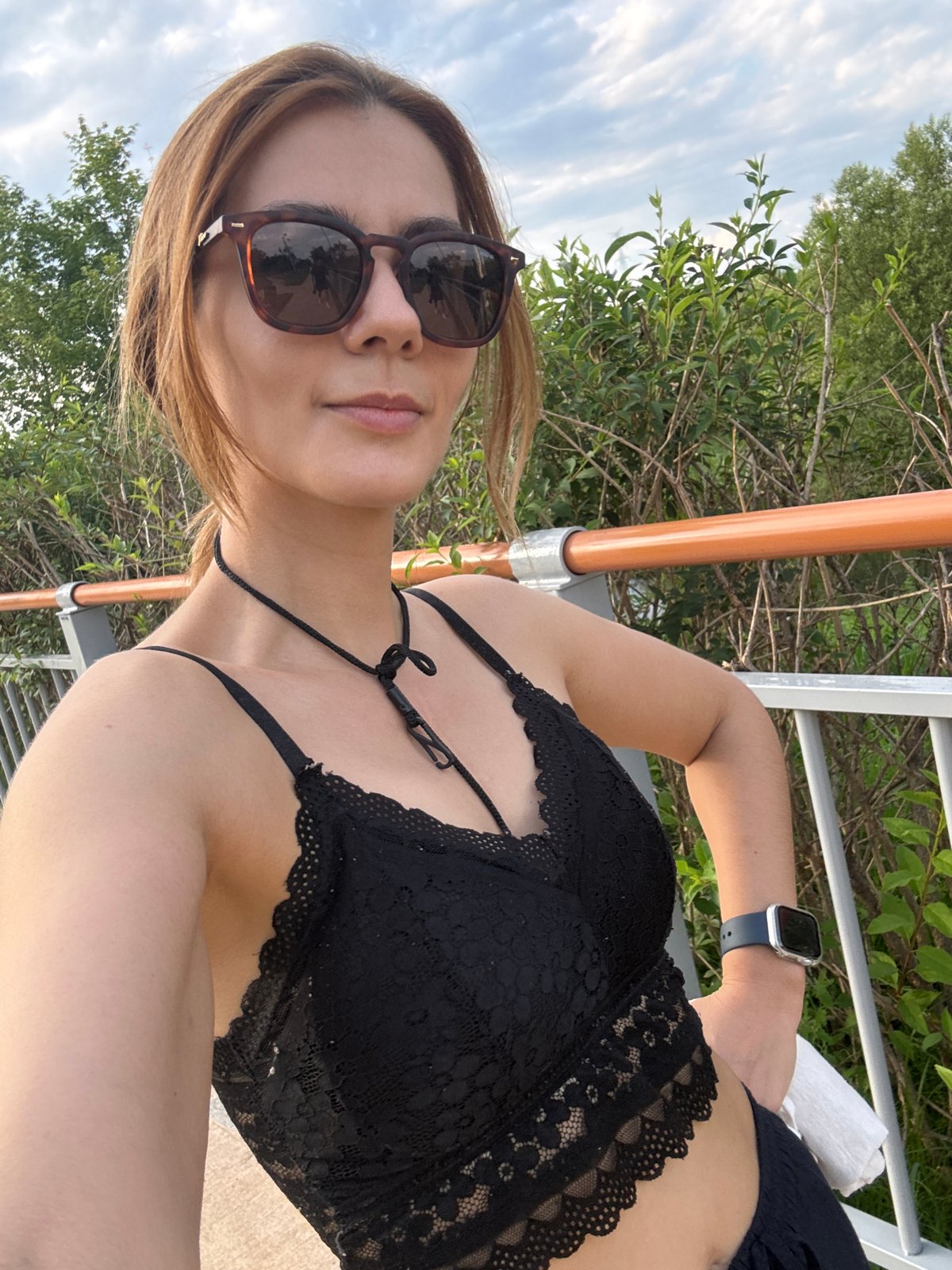 Casual stroll and selfie along a railing in Gimpo-si