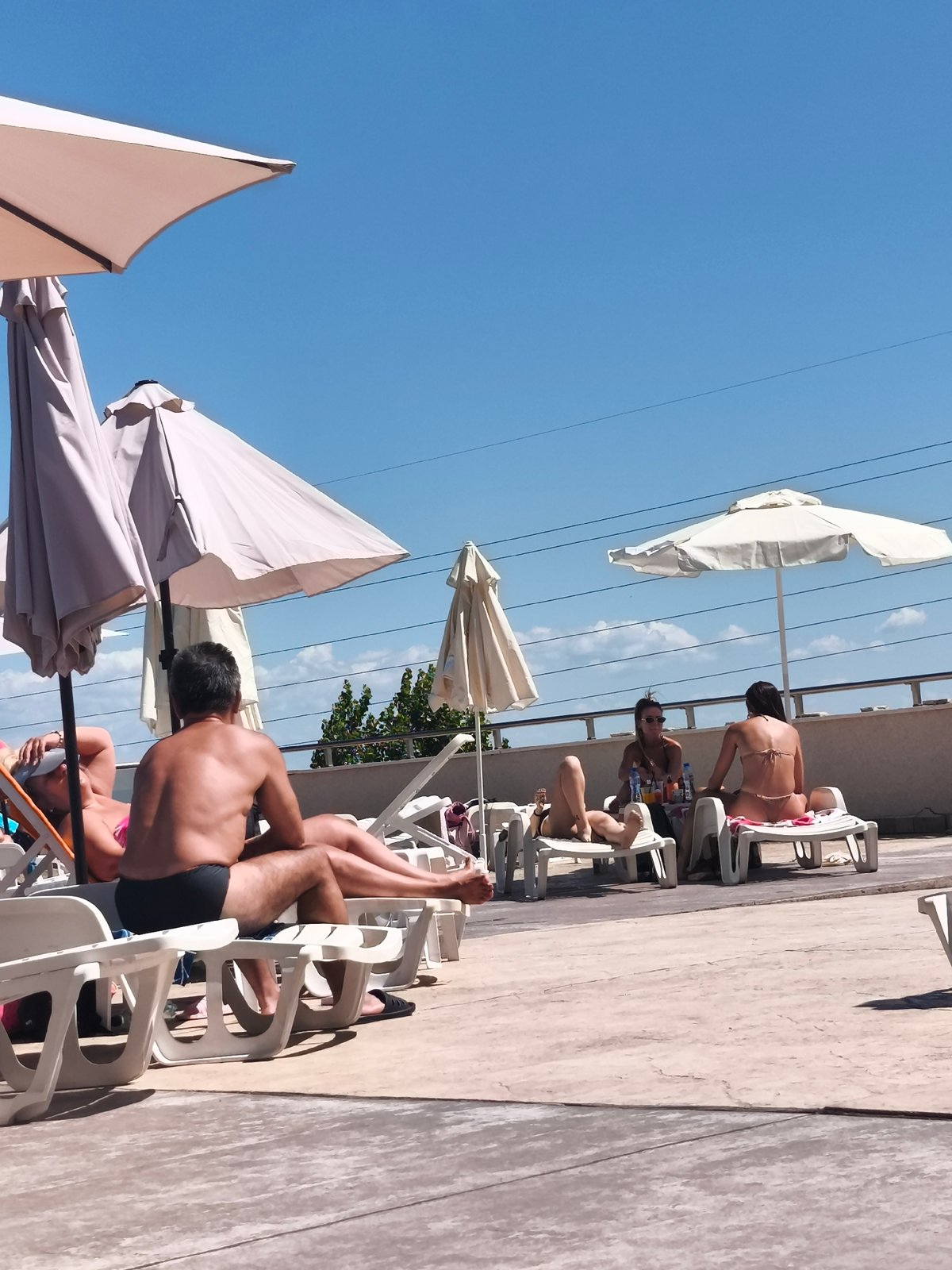 Poolside relaxation on a sunny morning in Asenovgrad