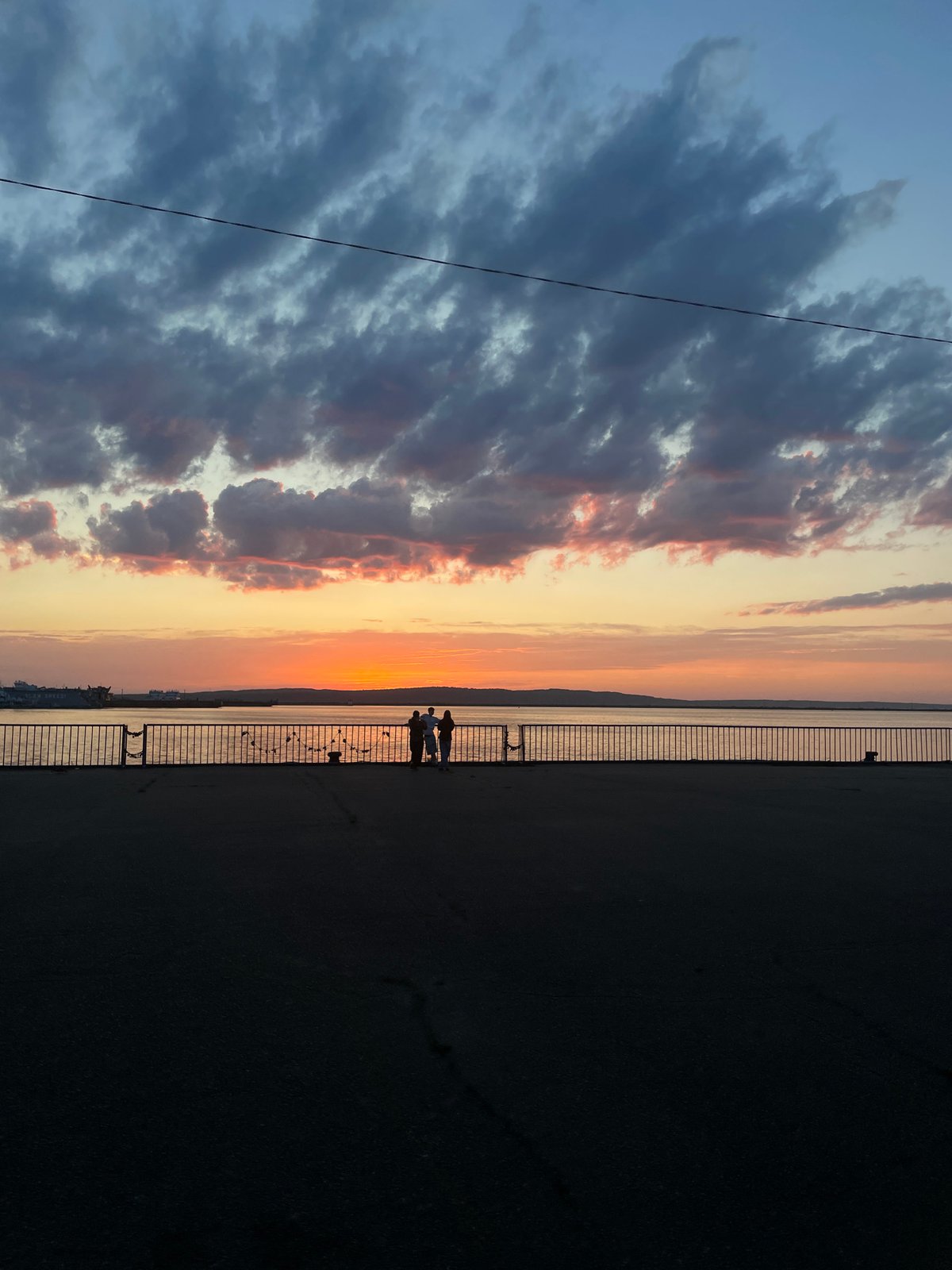Urban sunset scenes and caged rabbit observed during evening