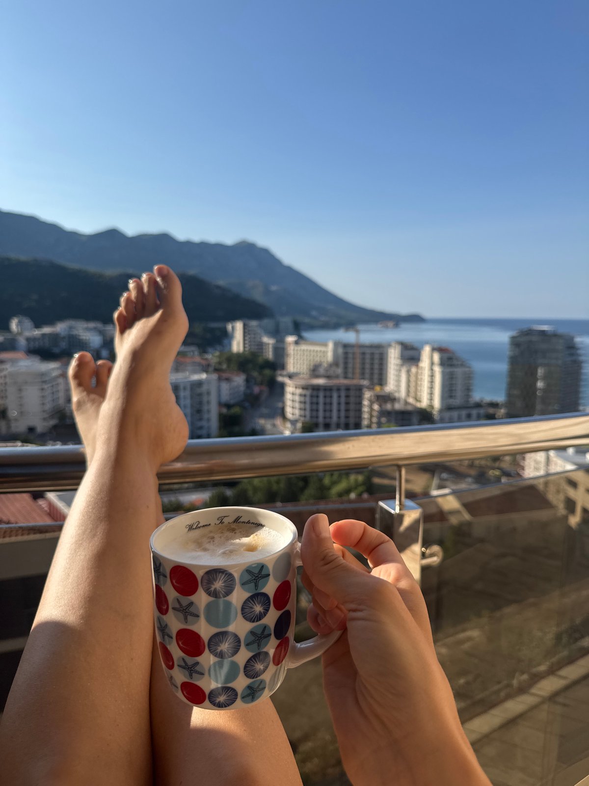 Morning coffee on the Montenegrin coast, mug and all