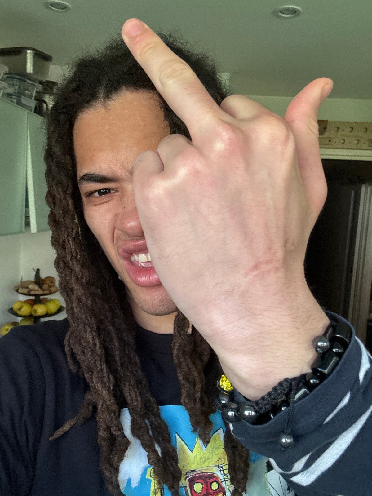 Man with dreadlocks photographed in Les Ulis, France