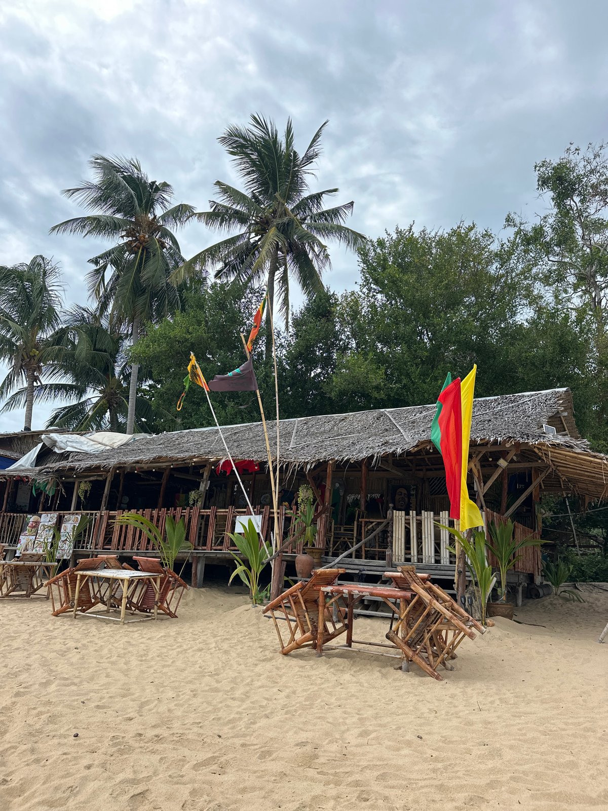 Thatched beachside structure on a cloudy Ko Samui day