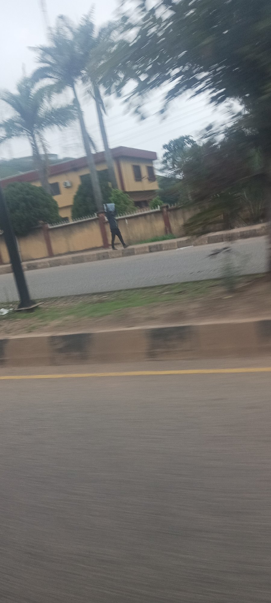 Street scenes captured from moving vehicle in Jos, Nigeria