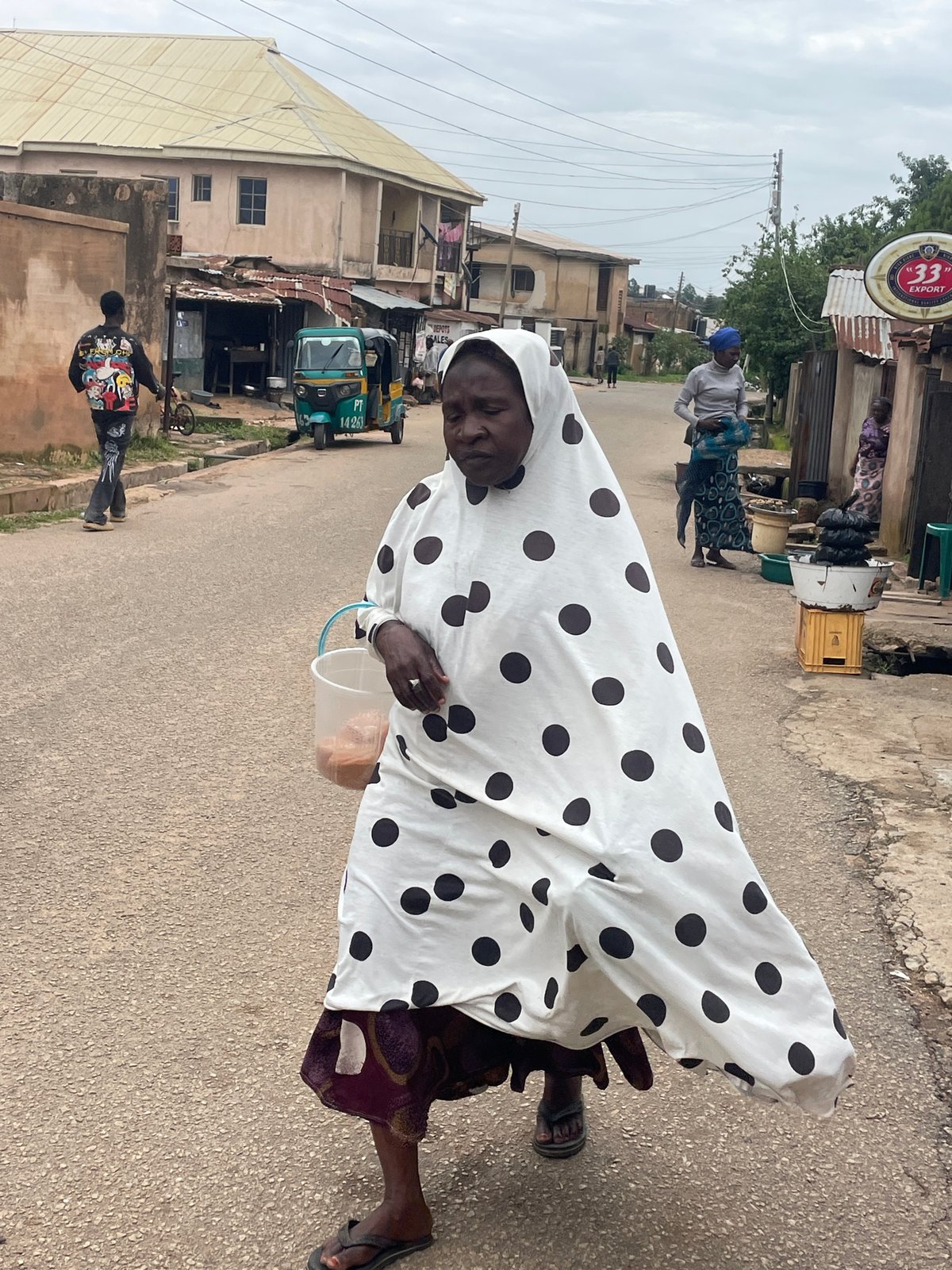 Everyday street and shop life across Jos, Nigeria.