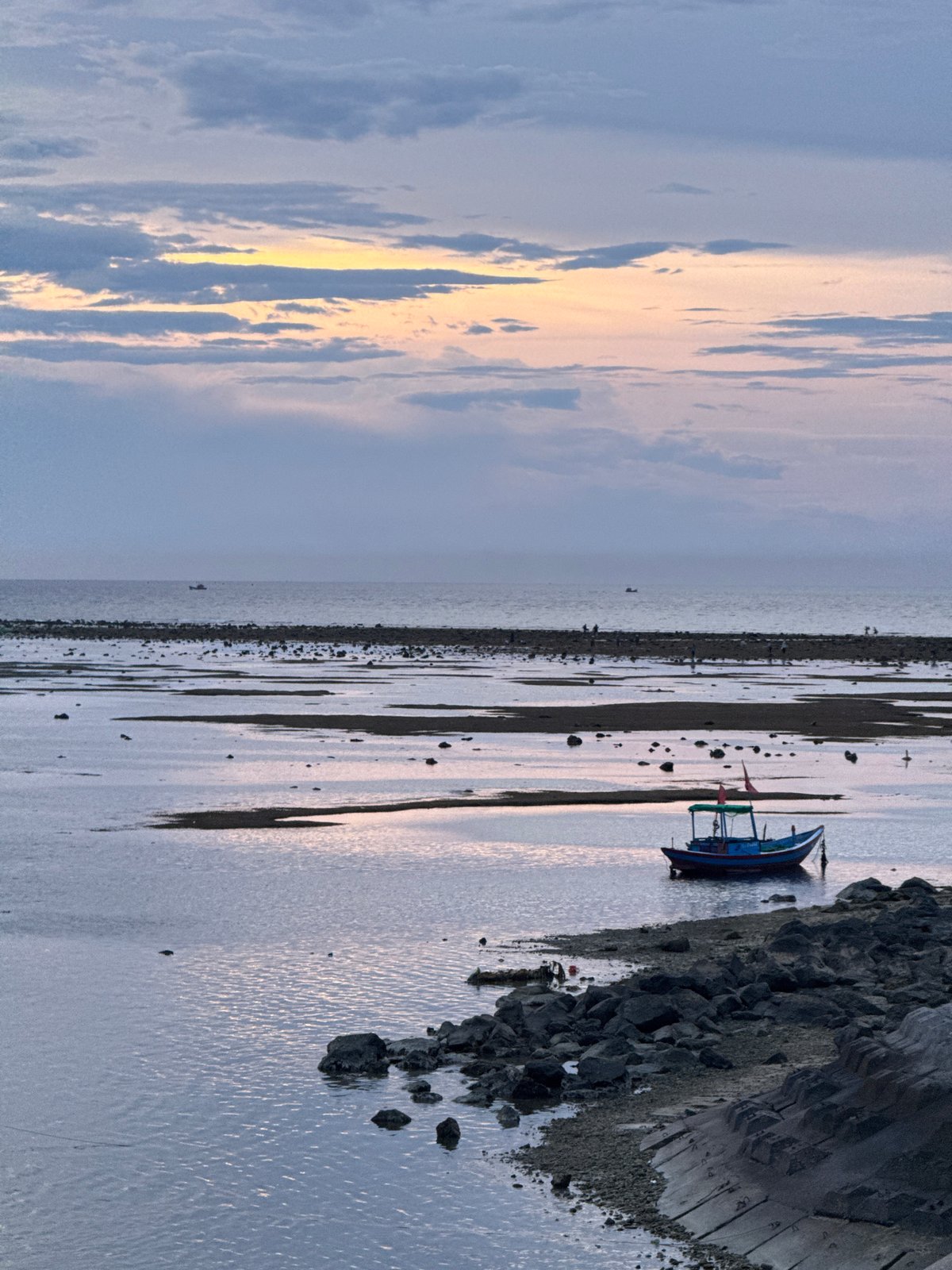 Fishing boats at dusk in Lý Sơn Island harbor