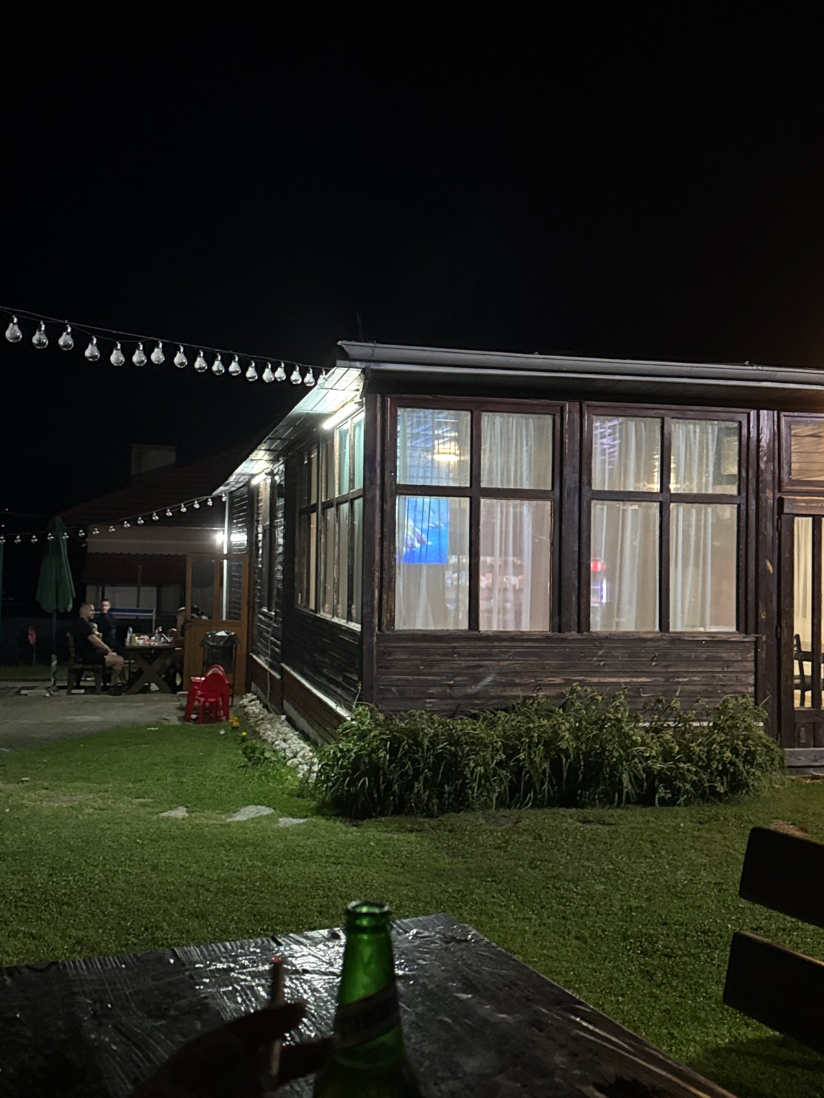 Evening dining documented at Gabrene restaurant with art and portraits
