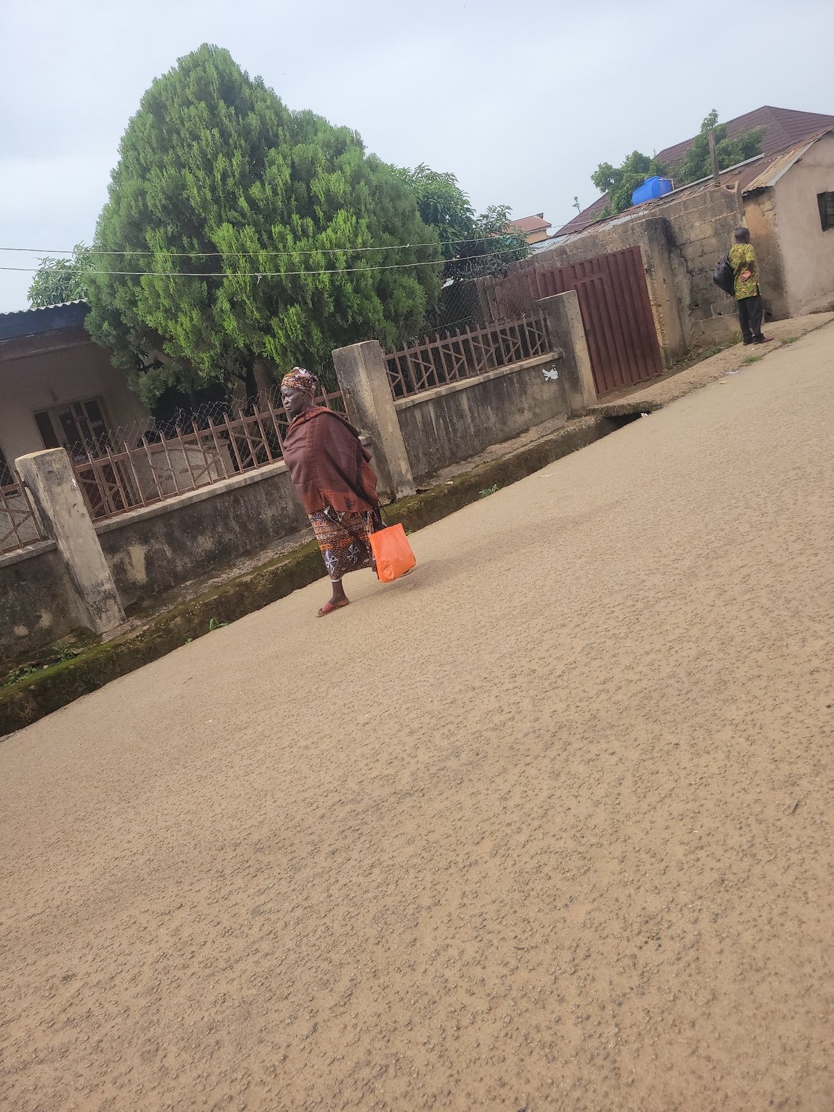 Morning street life documented across Jos, Nigeria neighborhoods