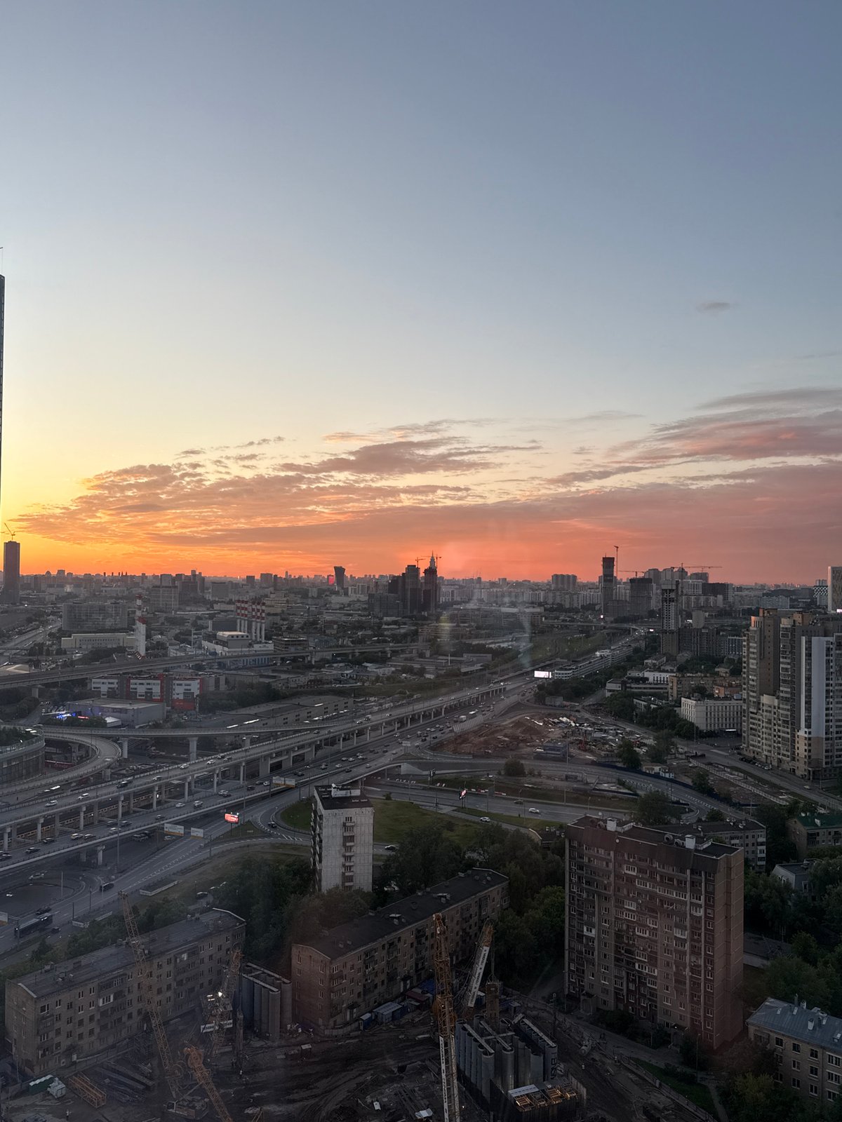 Sunset views and indoor cat moments in Khimki