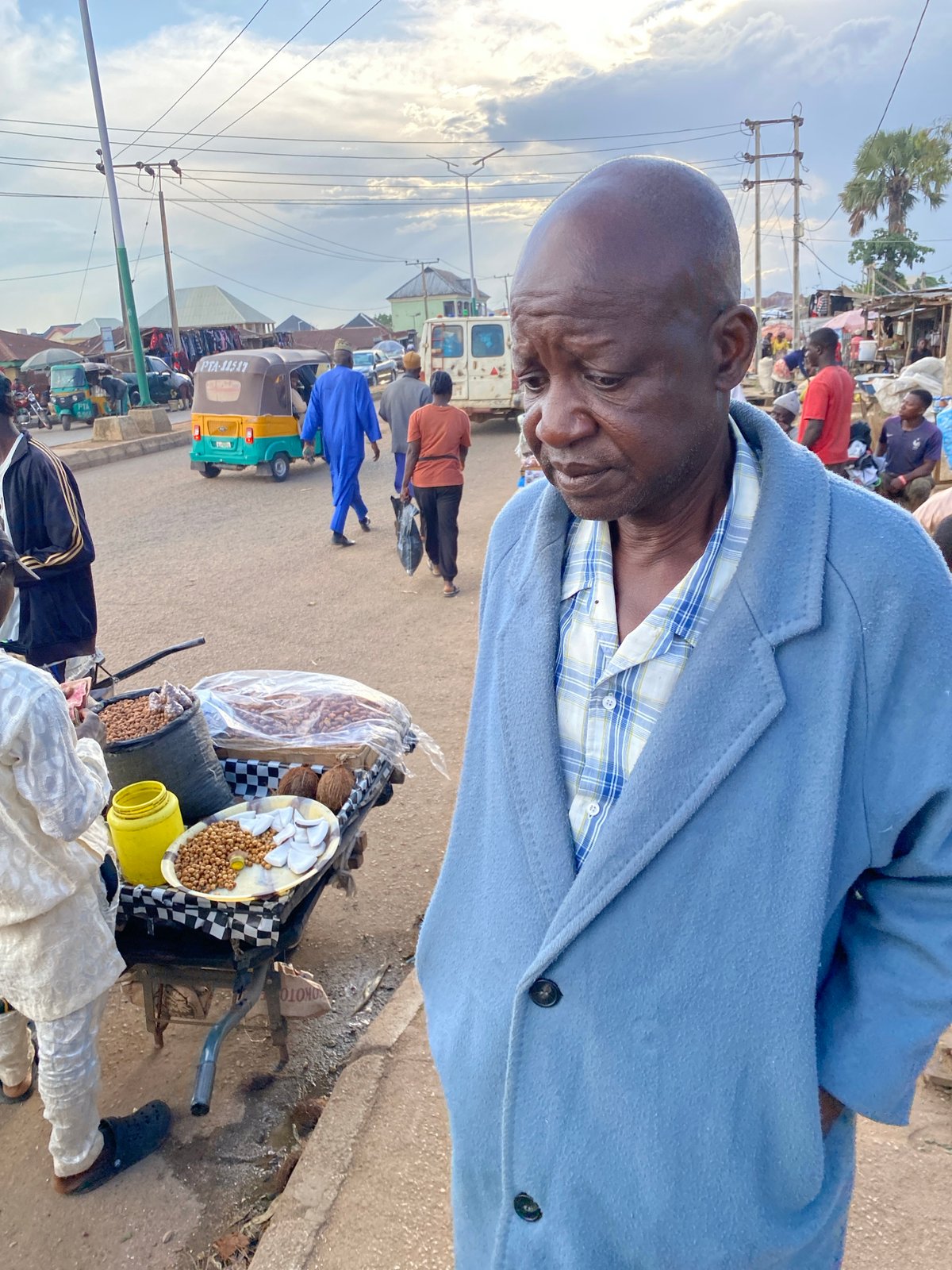 Street-level market life and daily movement in Bukuru, Nigeria