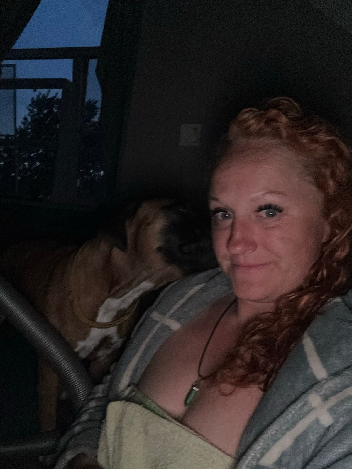 Woman photographed at home in Chaikovsky during evening hours
