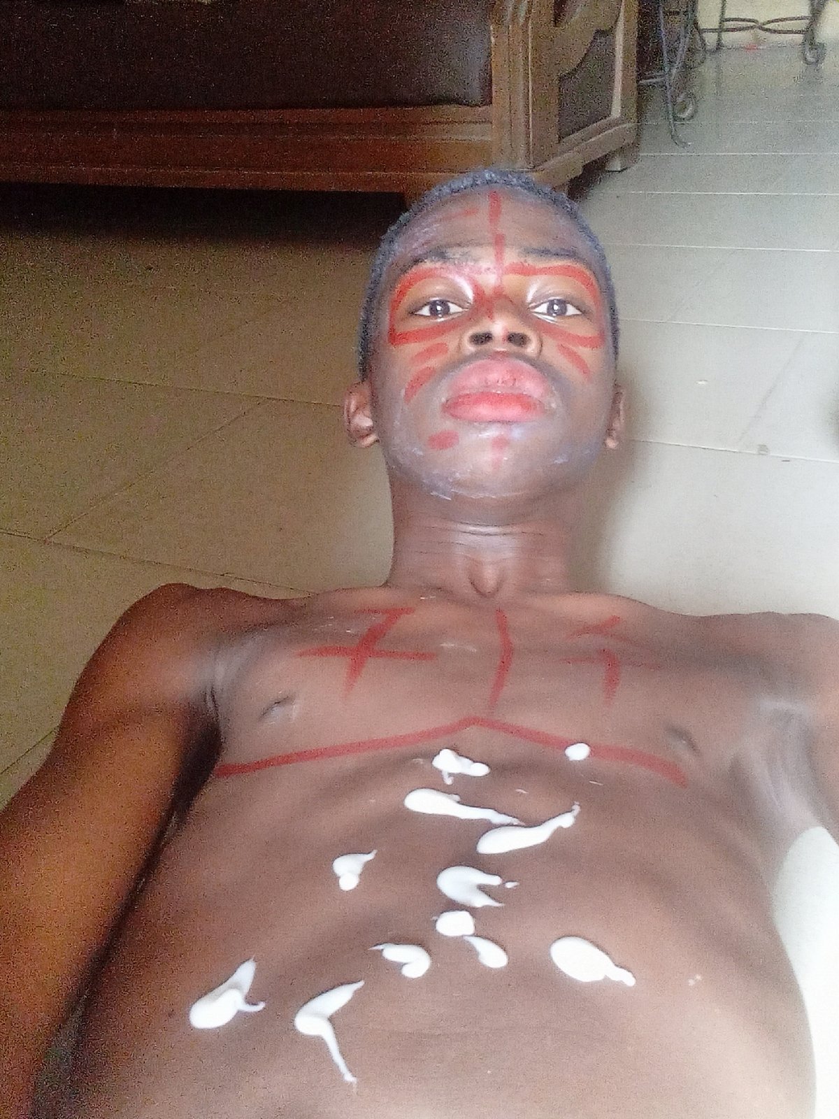 Traditional body painting ceremony documented in Onitsha, Nigeria