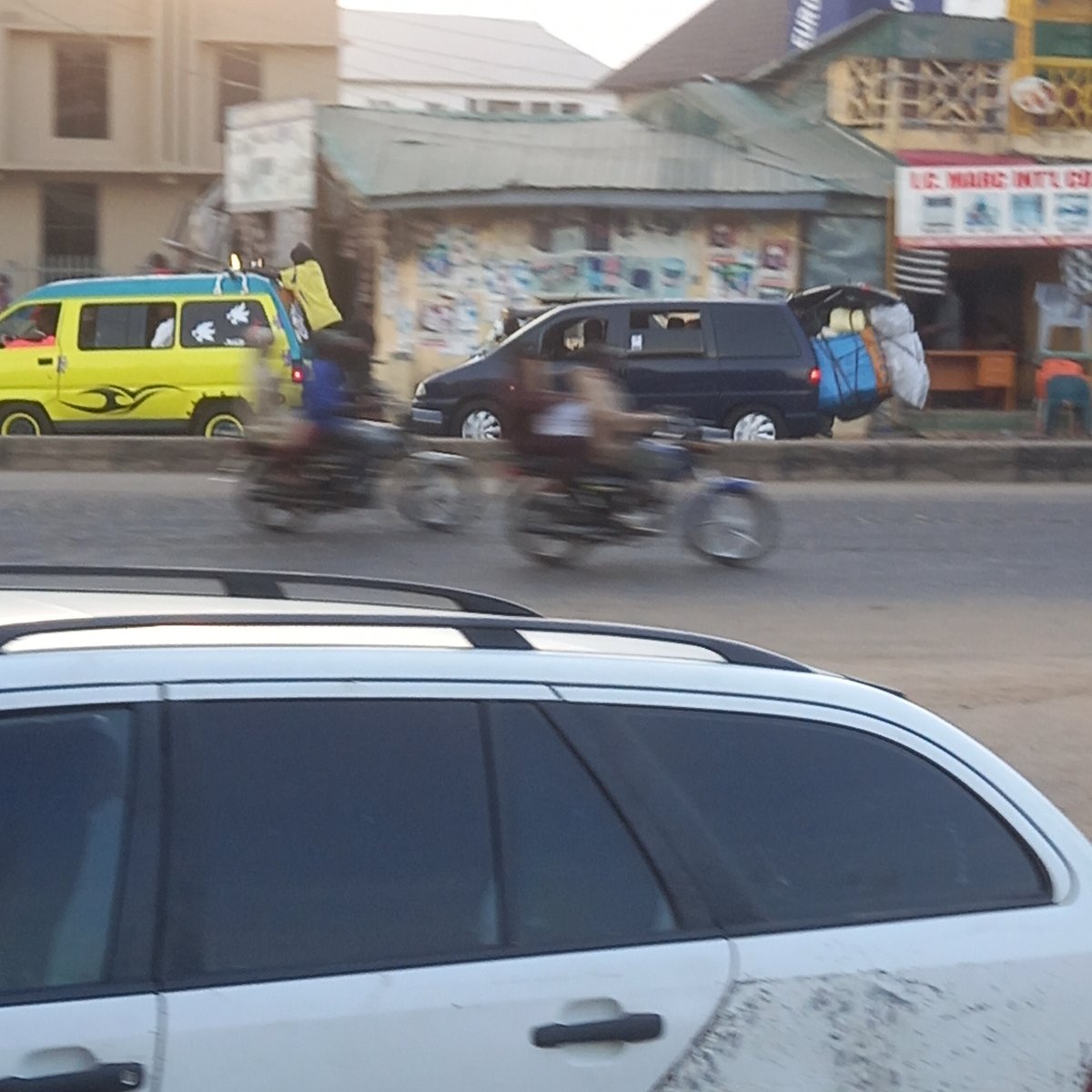 Daily street life documented across two Nigerian towns